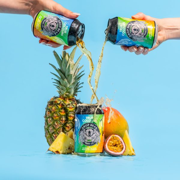 Drop Bear Pride Beer being poured over can of beer and fruit