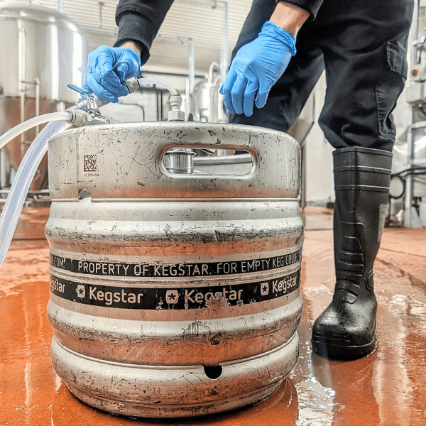 A keg being filled with non alcoholic beer.